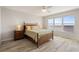 Bedroom with a wooden bed frame and ocean view at 101 N Marion Ct # 225, Punta Gorda, FL 33950