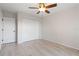 Bright bedroom with double door closet and wood-look floors at 101 N Marion Ct # 225, Punta Gorda, FL 33950