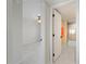 View of bedroom and bathroom with tile flooring and ceiling fan at 101 N Marion Ct # 225, Punta Gorda, FL 33950