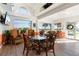 Relaxing community room featuring a glass-top table and comfortable seating at 101 N Marion Ct # 225, Punta Gorda, FL 33950