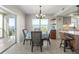 Dining area with water view and access to balcony at 101 N Marion Ct # 225, Punta Gorda, FL 33950