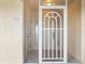 Bright entryway with white door and screen door leading inside at 101 N Marion Ct # 225, Punta Gorda, FL 33950