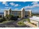 Attractive waterfront condo building with ample parking and lush landscaping at 101 N Marion Ct # 225, Punta Gorda, FL 33950