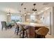 Modern kitchen with large island, white cabinets, and granite counters at 101 N Marion Ct # 225, Punta Gorda, FL 33950