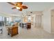 Open living area with kitchen and access to balcony at 101 N Marion Ct # 225, Punta Gorda, FL 33950