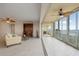 Living room with access to spacious balcony and water views at 101 N Marion Ct # 225, Punta Gorda, FL 33950
