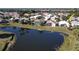 Property view near lake, community visible at 10208 Arrowhead Dr, Punta Gorda, FL 33955