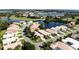 Luxury homes surround a scenic lake and golf course at 10208 Arrowhead Dr, Punta Gorda, FL 33955