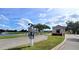 Gated community entrance with lake view at 10208 Arrowhead Dr, Punta Gorda, FL 33955