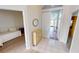 Bright entryway with light flooring, and views into other rooms at 10208 Arrowhead Dr, Punta Gorda, FL 33955