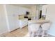 Kitchen with white cabinets, stainless steel appliances, and a breakfast bar at 10208 Arrowhead Dr, Punta Gorda, FL 33955