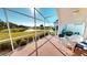 Spacious screened lanai with lake view and outdoor seating at 10208 Arrowhead Dr, Punta Gorda, FL 33955