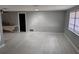 Neutral bedroom featuring freshly painted walls and a large window providing natural light at 1108 Ample Ave, Port Charlotte, FL 33948