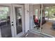 Back patio with access to sunroom and bedroom at 1108 Ample Ave, Port Charlotte, FL 33948