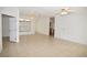 Bright living room with tile floors and ceiling fans at 12415 Catalina Dr, Punta Gorda, FL 33955