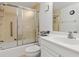 Bathroom with tub, shower, and updated vanity at 1601 Park Beach Cir # 112/2, Punta Gorda, FL 33950