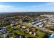 Neighborhood view of a well kept home with beautiful mature landscaping and nearby beach access at 1713 Belvidere Rd, Englewood, FL 34223