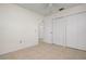 Bright bedroom with tile floors and large closet at 1713 Belvidere Rd, Englewood, FL 34223