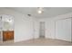 Bedroom with ensuite bathroom and double closet at 1713 Belvidere Rd, Englewood, FL 34223