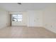 Spacious living room with tile floors and a view at 1713 Belvidere Rd, Englewood, FL 34223