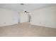 Open living room with tile floors and ceiling fan at 1713 Belvidere Rd, Englewood, FL 34223