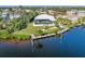 Waterfront property with private dock and spacious backyard at 18138 Petoskey Cir, Port Charlotte, FL 33948