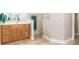 Bathroom with walk-in shower and single vanity at 18138 Petoskey Cir, Port Charlotte, FL 33948