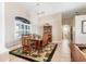 Charming dining room with wood table and chairs at 18138 Petoskey Cir, Port Charlotte, FL 33948