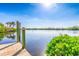 Private wooden dock offering serene waterfront views at 18138 Petoskey Cir, Port Charlotte, FL 33948