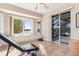 Home gym with pool view, window seat, and exercise equipment at 18138 Petoskey Cir, Port Charlotte, FL 33948