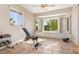 Bright home gym with window seat, weight bench, and free weights at 18138 Petoskey Cir, Port Charlotte, FL 33948