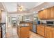 Well-equipped kitchen with island and granite countertops at 18138 Petoskey Cir, Port Charlotte, FL 33948