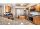 Spacious kitchen with stainless steel appliances and granite countertops at 18138 Petoskey Cir, Port Charlotte, FL 33948