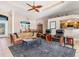 Bright living room featuring a sofa and armchairs at 18138 Petoskey Cir, Port Charlotte, FL 33948