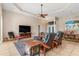 Open living space with large TV and comfortable seating at 18138 Petoskey Cir, Port Charlotte, FL 33948