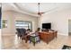 Living room with water views and comfortable seating at 18138 Petoskey Cir, Port Charlotte, FL 33948