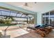 Pool area with patio furniture and waterfront view at 18138 Petoskey Cir, Port Charlotte, FL 33948