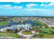 Aerial view of community with pool, golf, and tennis at 1916 Nottingham Trl, Punta Gorda, FL 33980