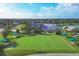 Community lawn bowling green with surrounding landscape at 1916 Nottingham Trl, Punta Gorda, FL 33980