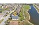 Aerial view of house near golf course and lake at 24088 Buckingham Way, Punta Gorda, FL 33980