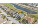 Aerial view of house near golf course and lake at 24088 Buckingham Way, Punta Gorda, FL 33980