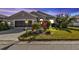 Attractive single-story home with well-manicured lawn and landscaping at 24088 Buckingham Way, Punta Gorda, FL 33980