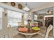 Kitchen dining area with table and view of office at 2442 Cologne Ln, Punta Gorda, FL 33983