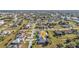 Aerial view of a single Gathering home and surrounding neighborhood at 26081 Templar Ln, Punta Gorda, FL 33983