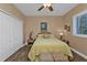 Light and airy bedroom with double doors and tiled floors at 26081 Templar Ln, Punta Gorda, FL 33983