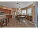 Bright dining area with wooden table and chairs near kitchen at 26081 Templar Ln, Punta Gorda, FL 33983