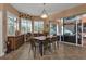 Casual dining area with a wooden table and six chairs at 26081 Templar Ln, Punta Gorda, FL 33983