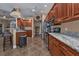 Modern kitchen with stainless steel appliances and wood cabinets at 26081 Templar Ln, Punta Gorda, FL 33983