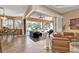 Open living space with sliding doors leading to a relaxing patio at 26081 Templar Ln, Punta Gorda, FL 33983