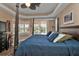 Serene main bedroom with a large bed and plenty of natural light at 26081 Templar Ln, Punta Gorda, FL 33983